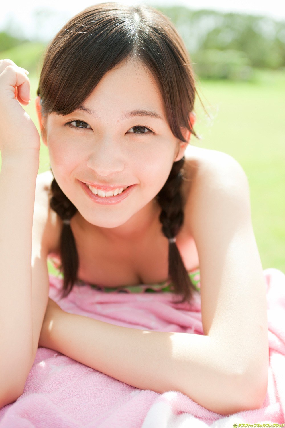 Smiling girl in braids