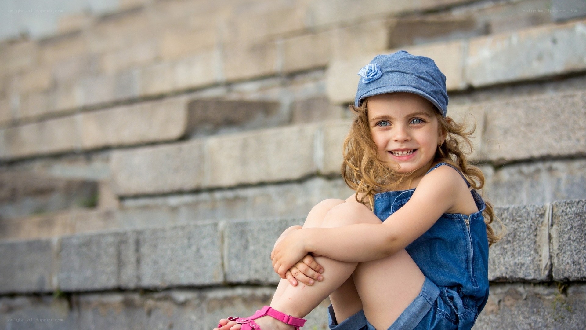 Smiling girl in denim outfit