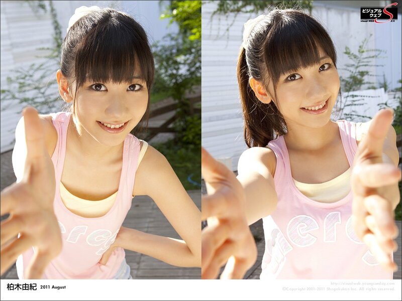 Smiling girl in pink tank top