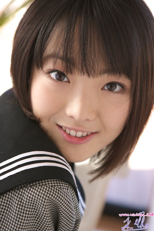 smiling girl in school uniform