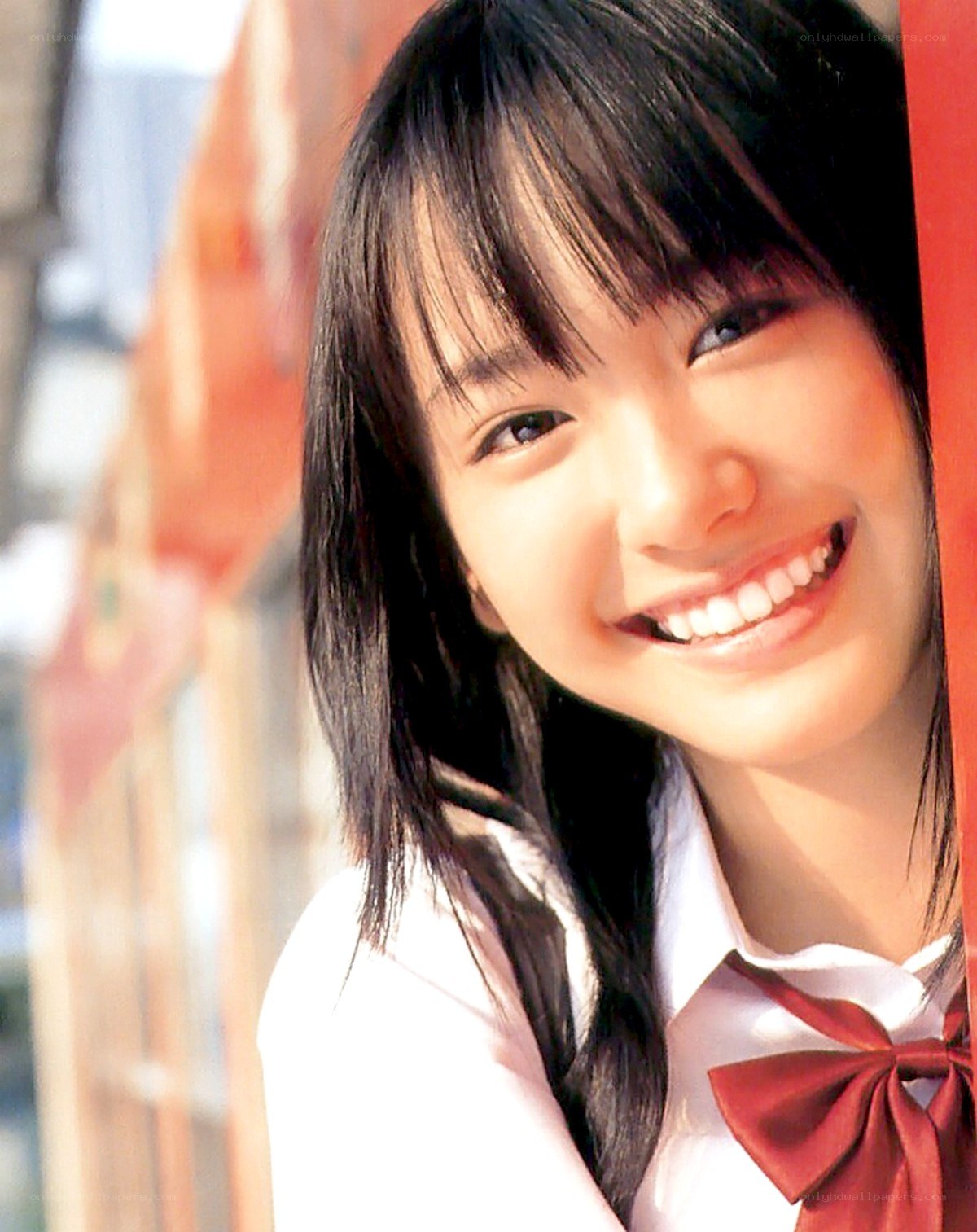 smiling girl in school uniform