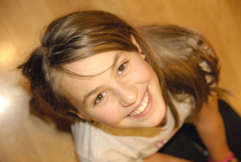 smiling girl looking up