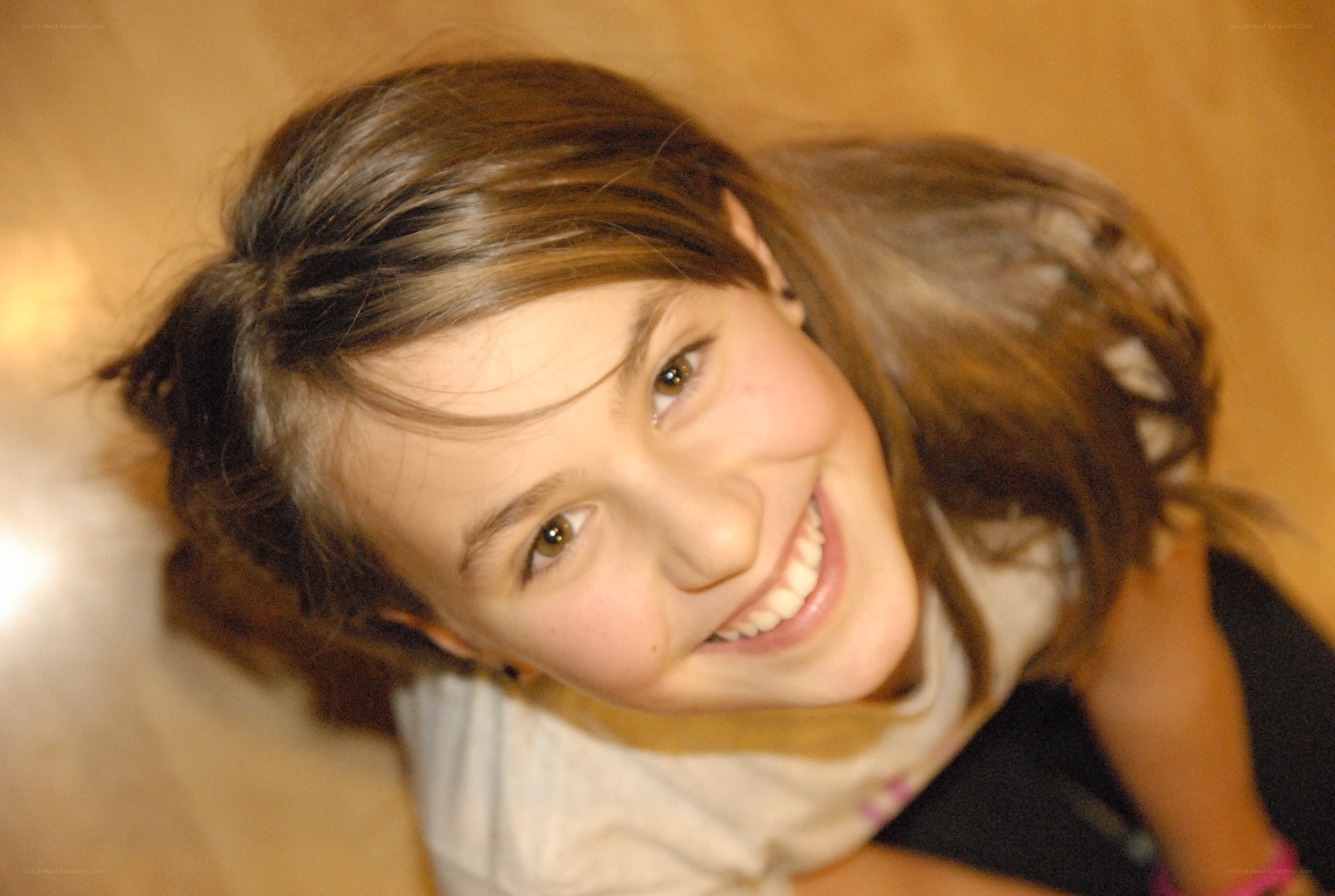 smiling girl looking up