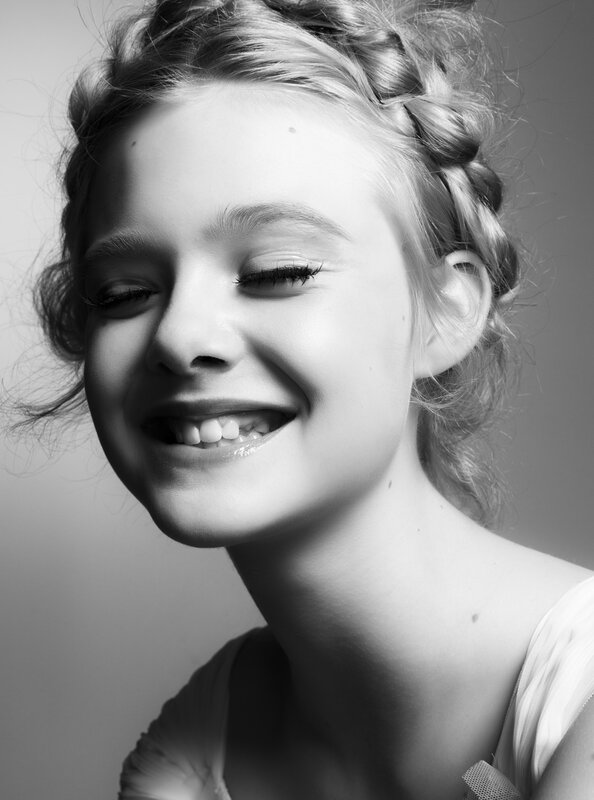 smiling girl with braided hair