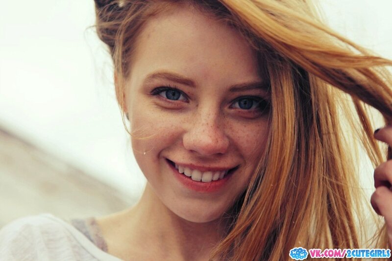 smiling girl with freckles