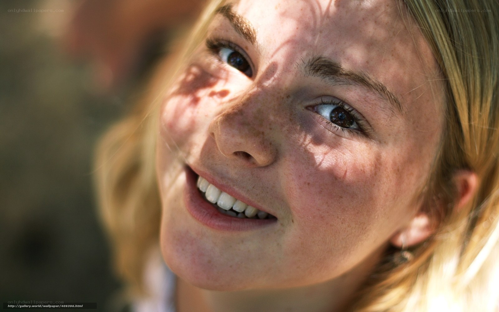 smiling girl with freckles