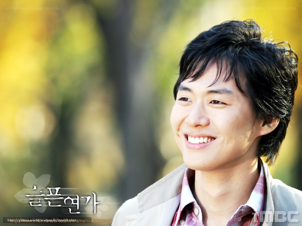 smiling man in autumn