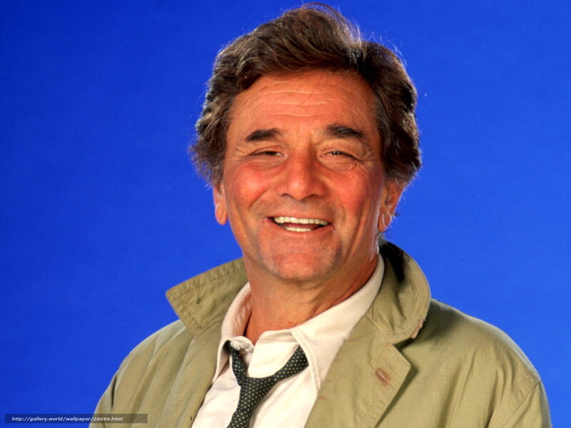 Smiling man in green jacket