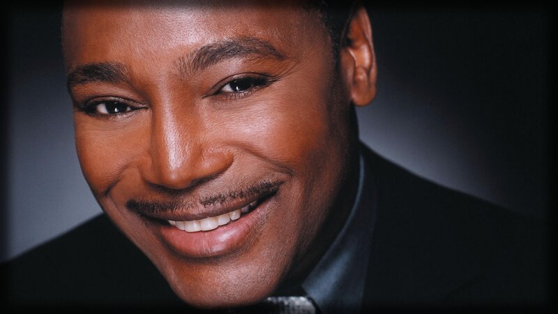 smiling man in suit