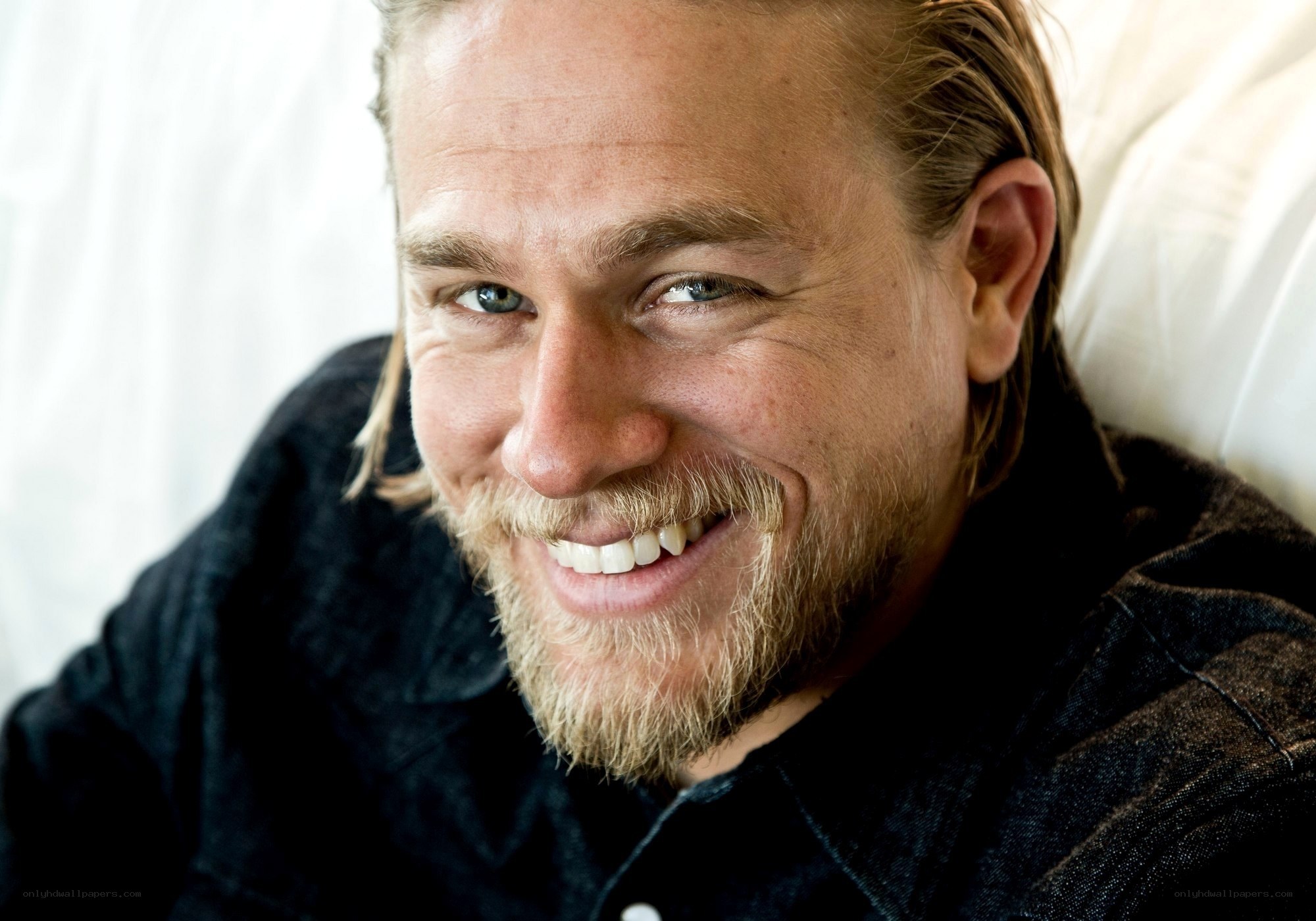 smiling man with beard