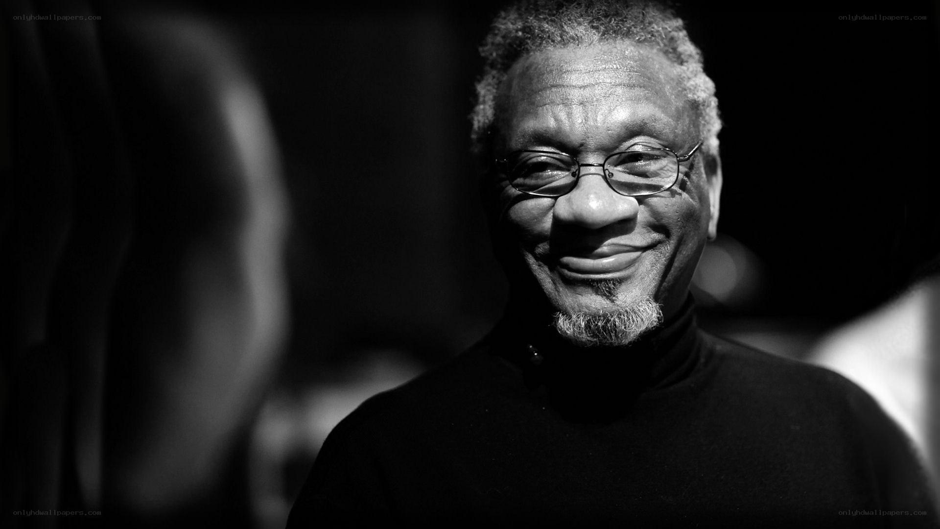 Smiling man with glasses