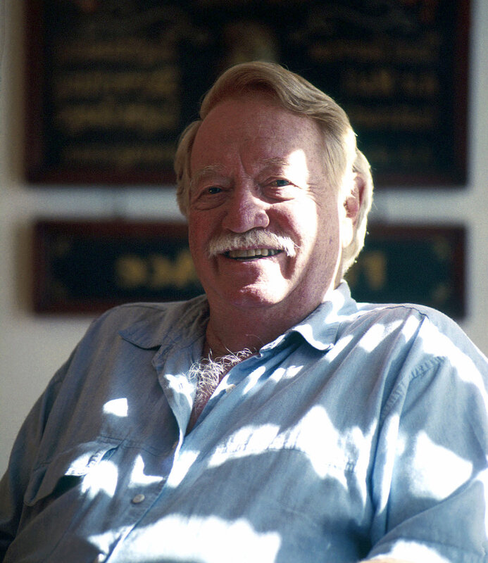 Smiling man with mustache