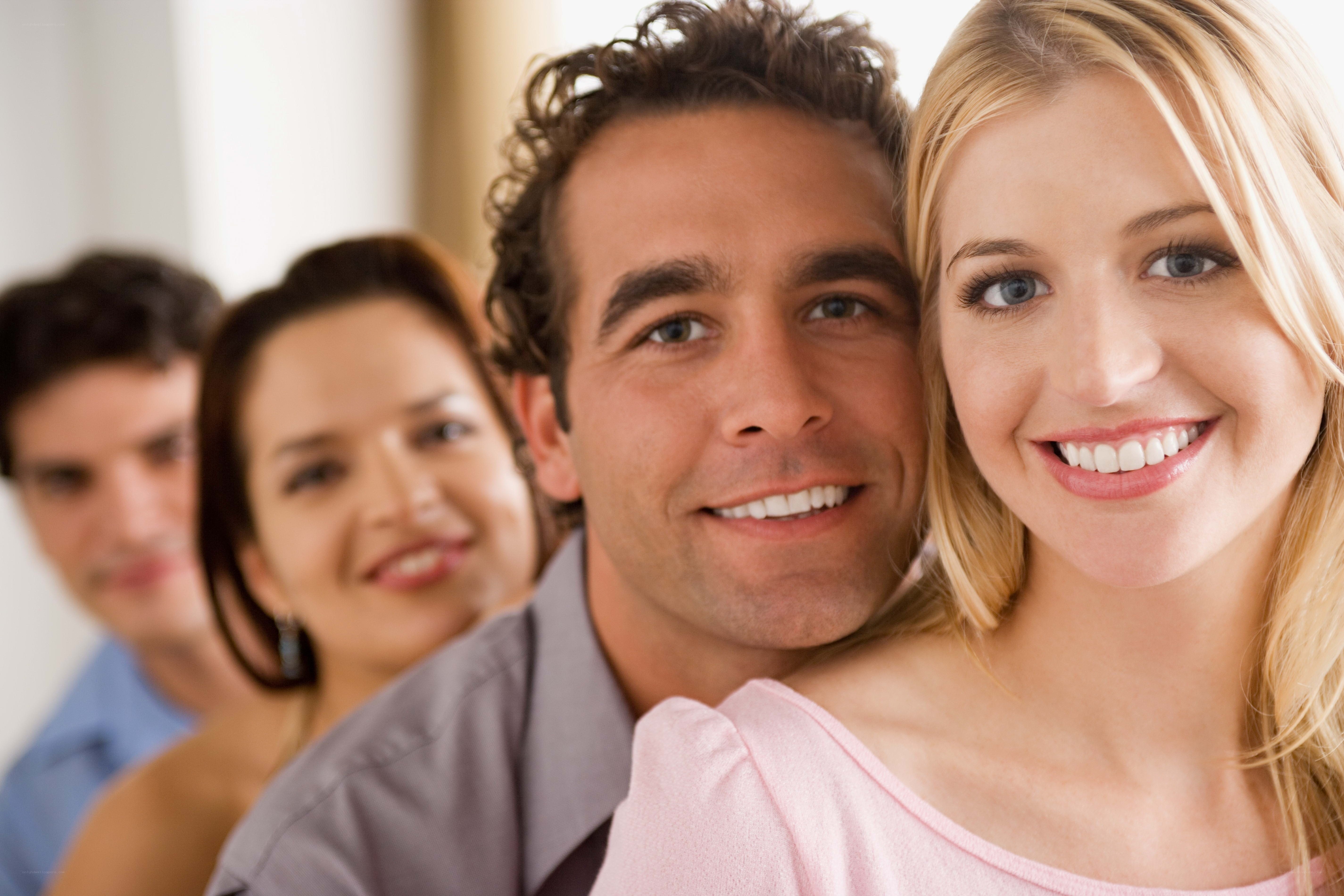 smiling people in a row