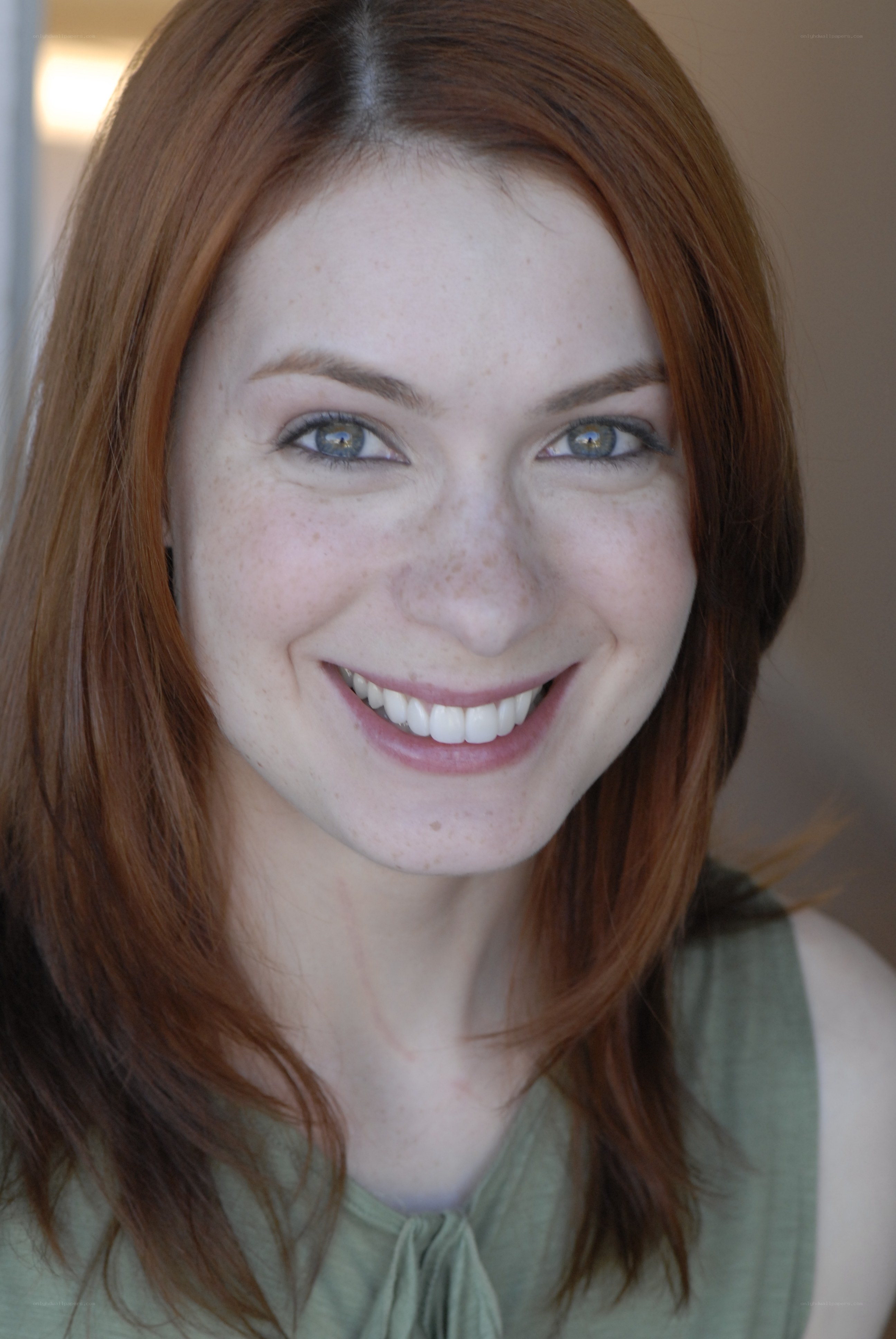 smiling red-haired woman