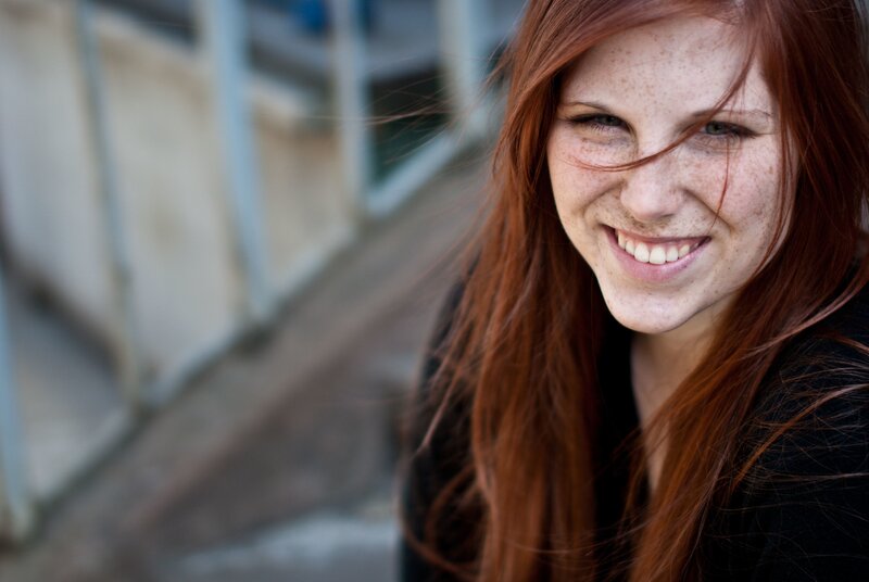 smiling red-haired woman