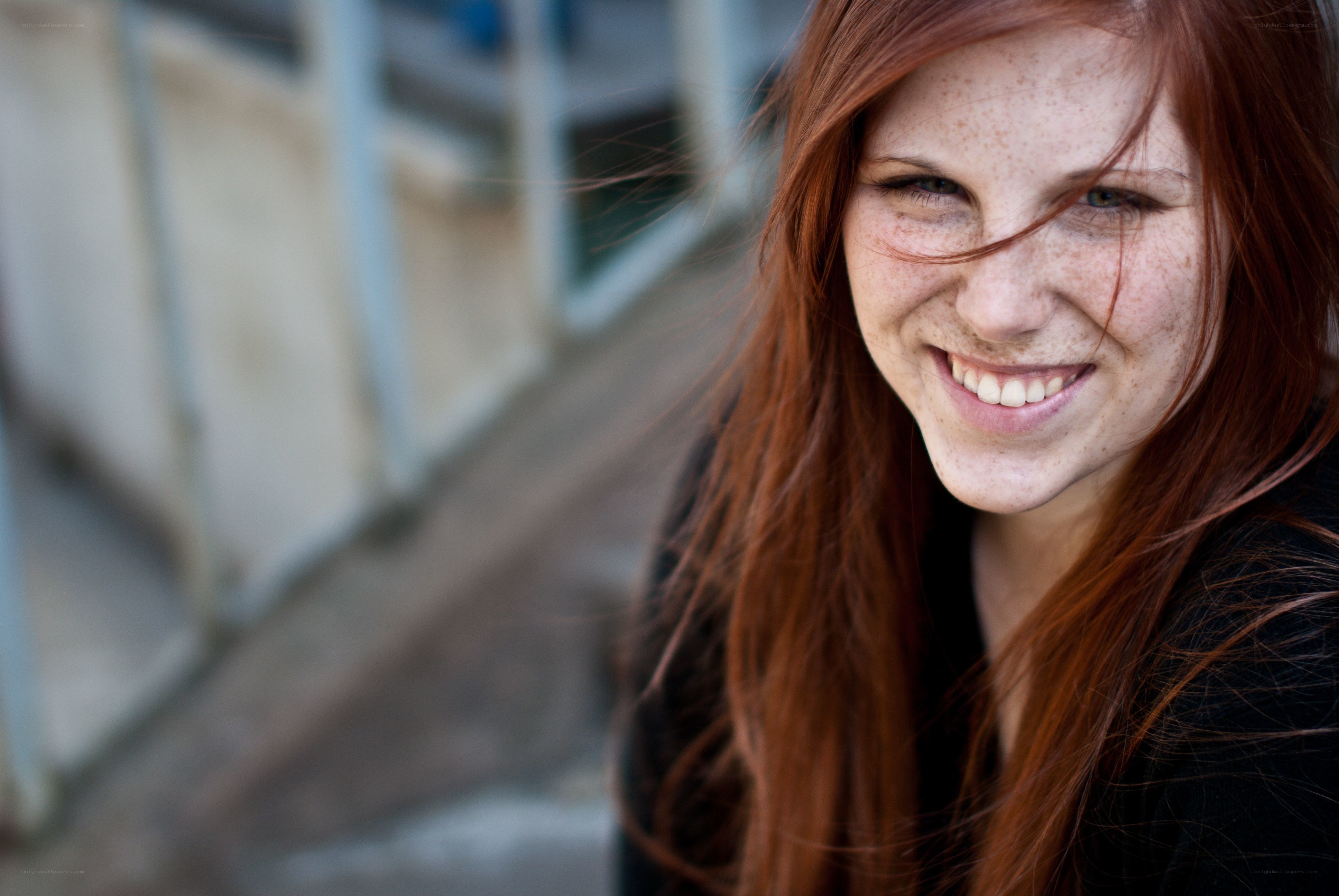 smiling red-haired woman