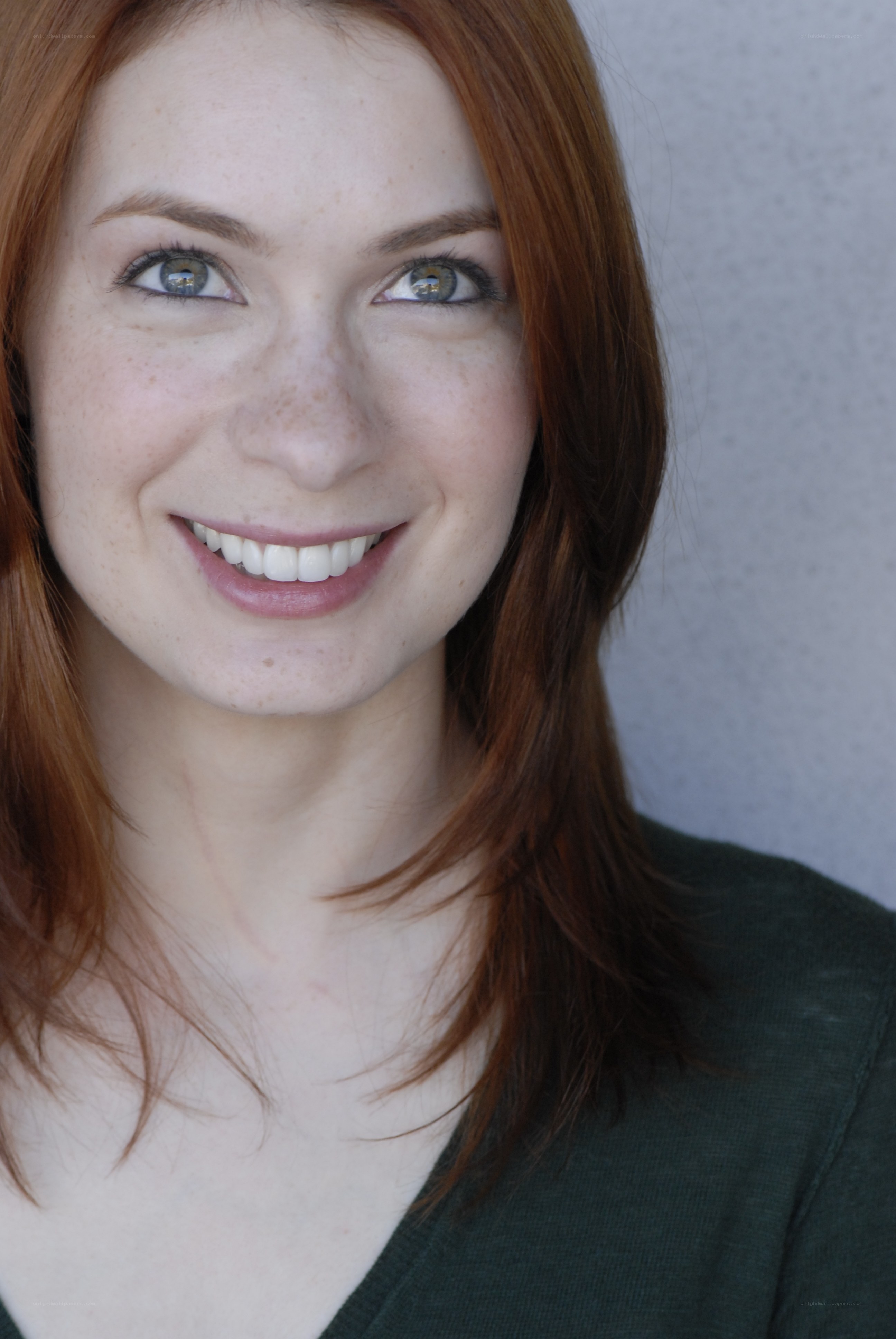 smiling red-haired woman