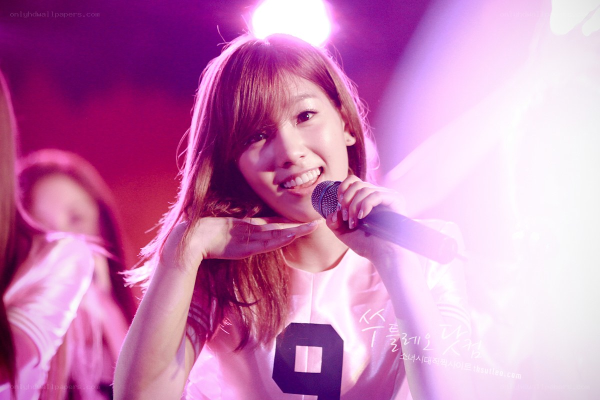 smiling singer on stage