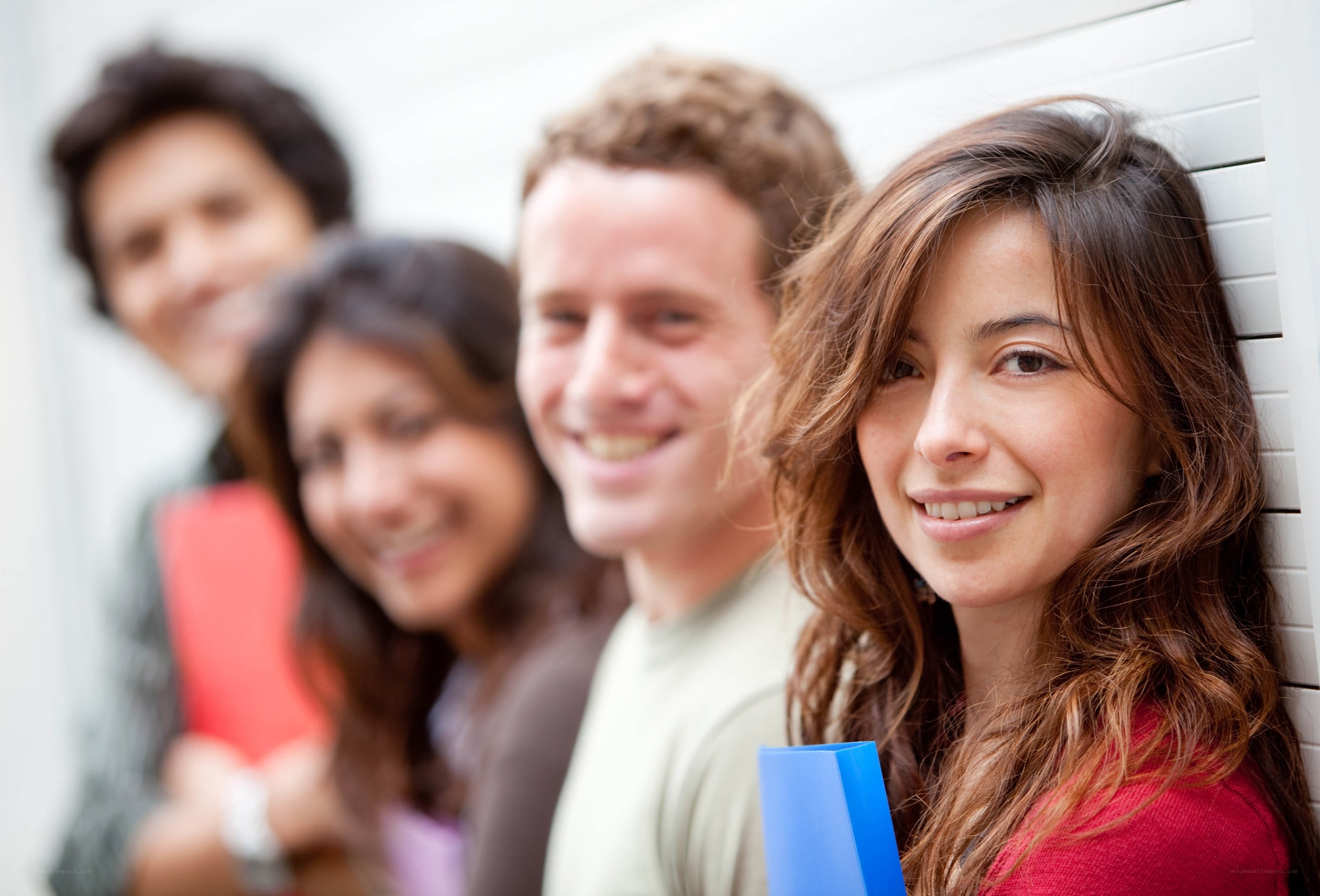 smiling students in a row