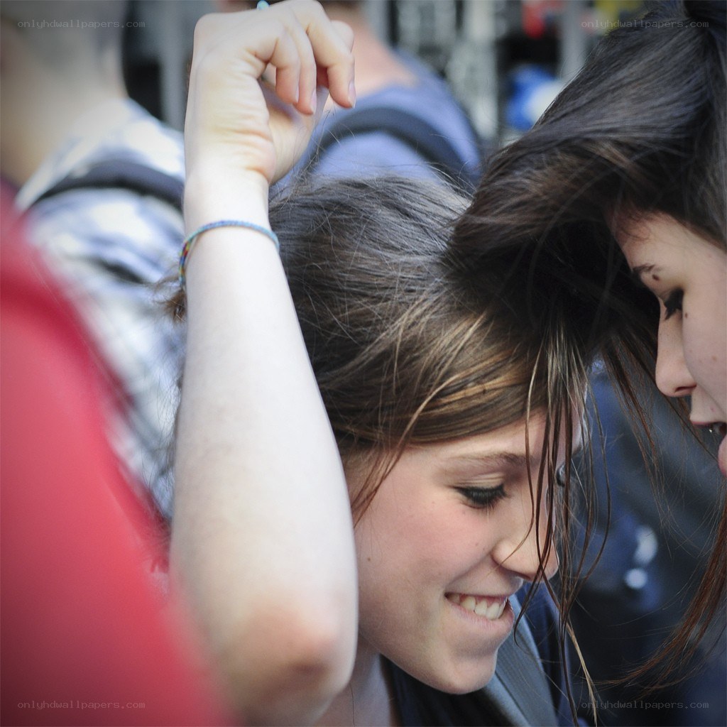 smiling woman at a crowd