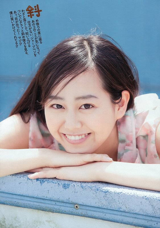 Smiling woman by the water
