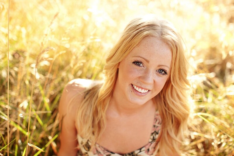 smiling woman in a field