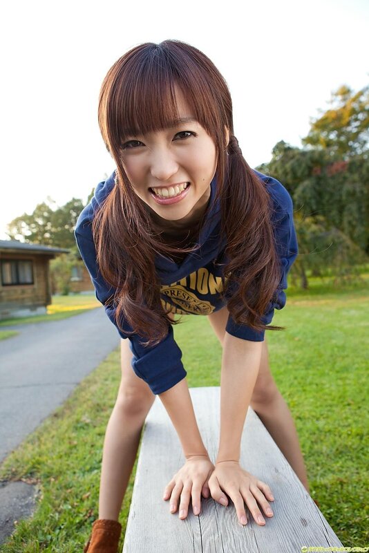 Smiling woman in blue hoodie