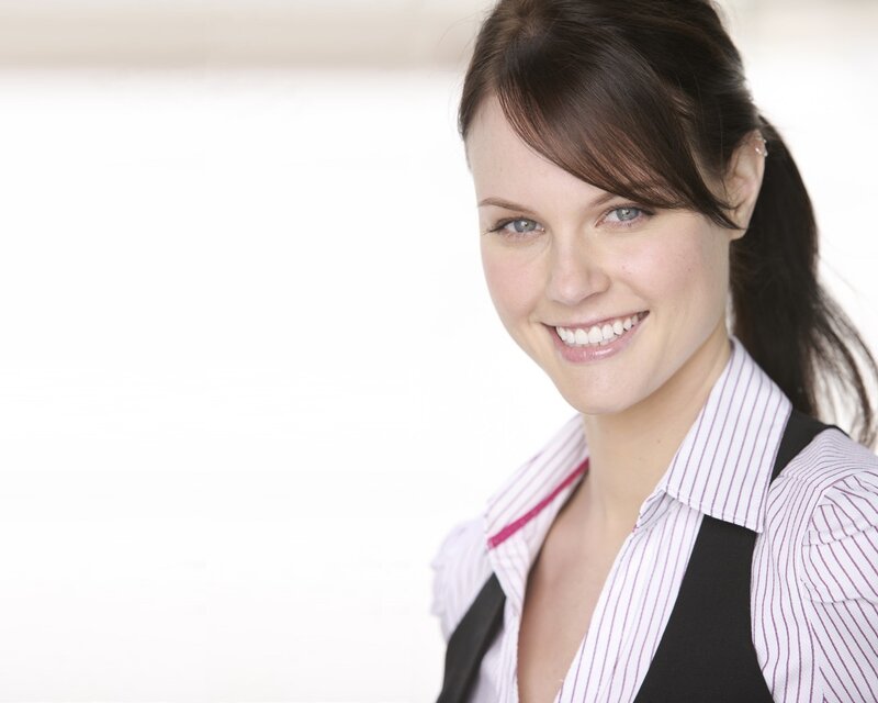 smiling woman in business attire