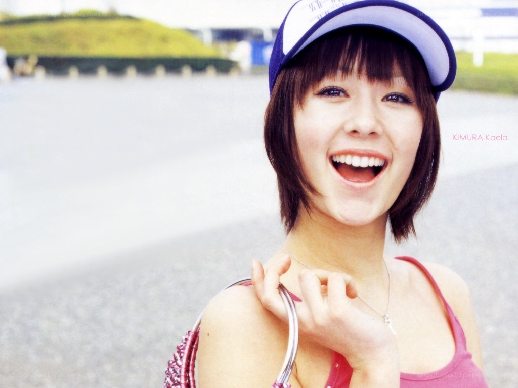 Smiling woman in cap