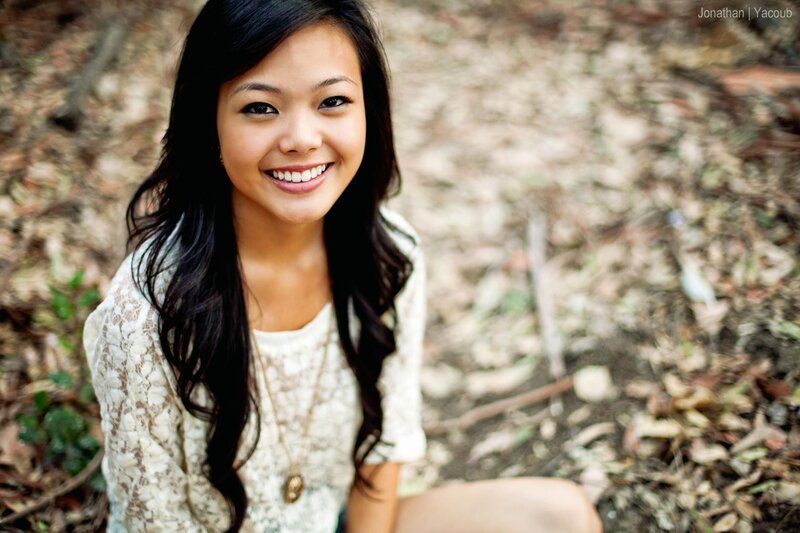 smiling woman in forest