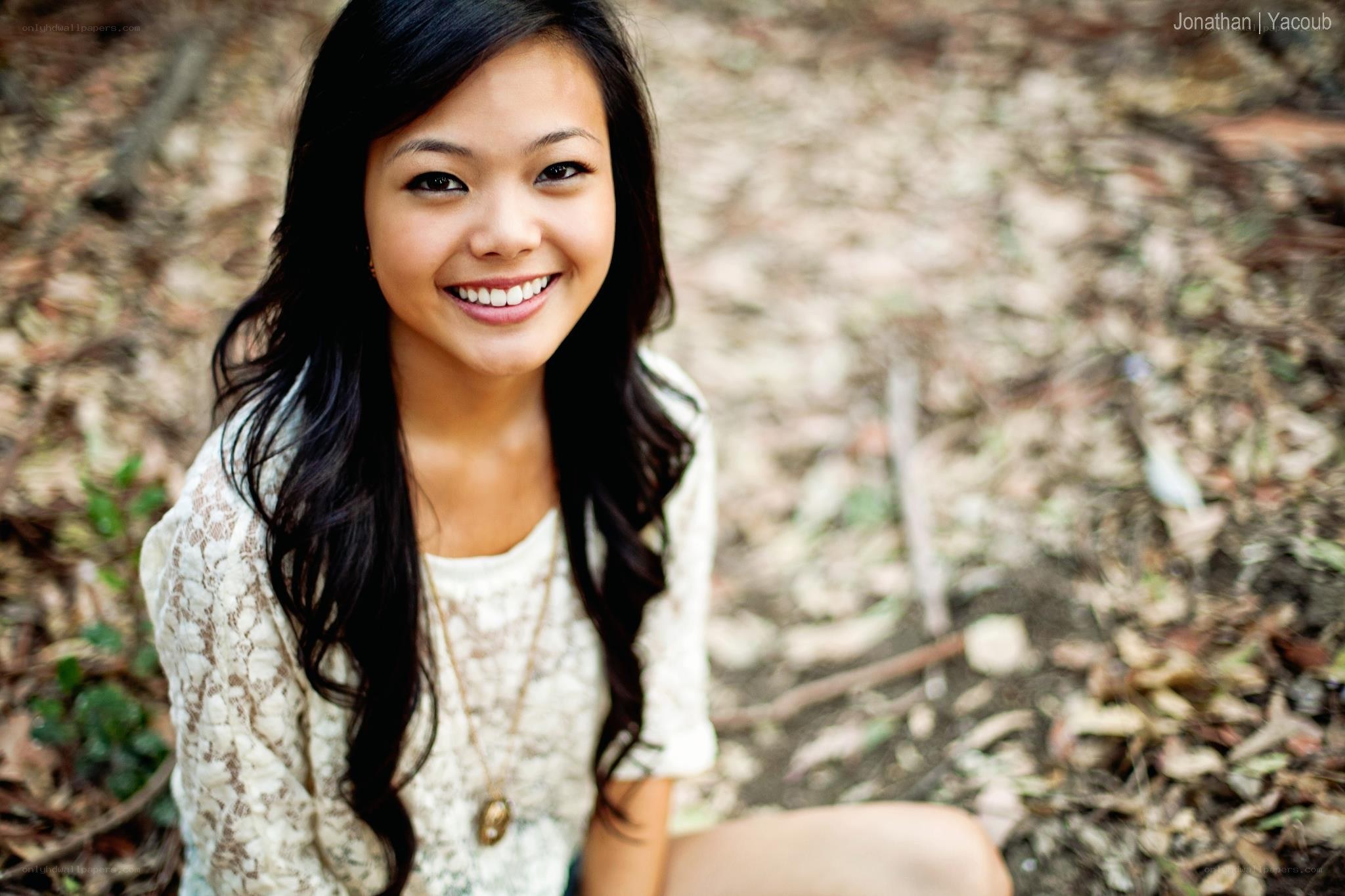 smiling woman in forest