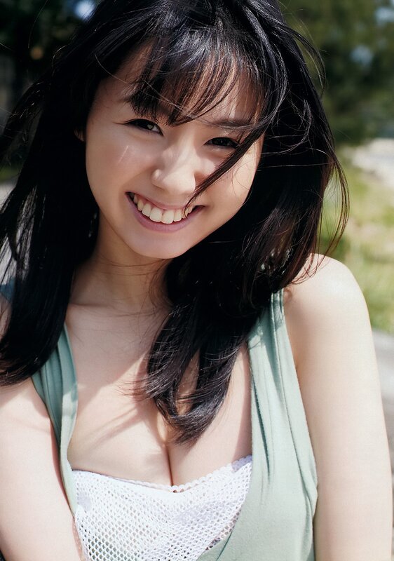 Smiling woman in green top