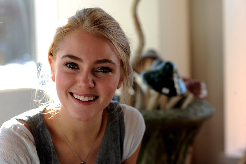 smiling woman in natural light