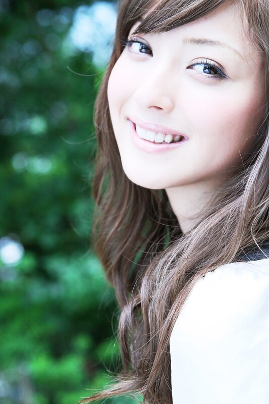 smiling woman in nature