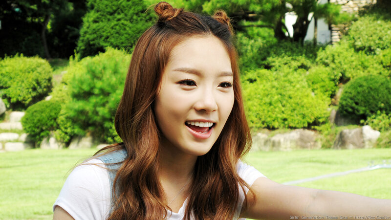 smiling woman in park