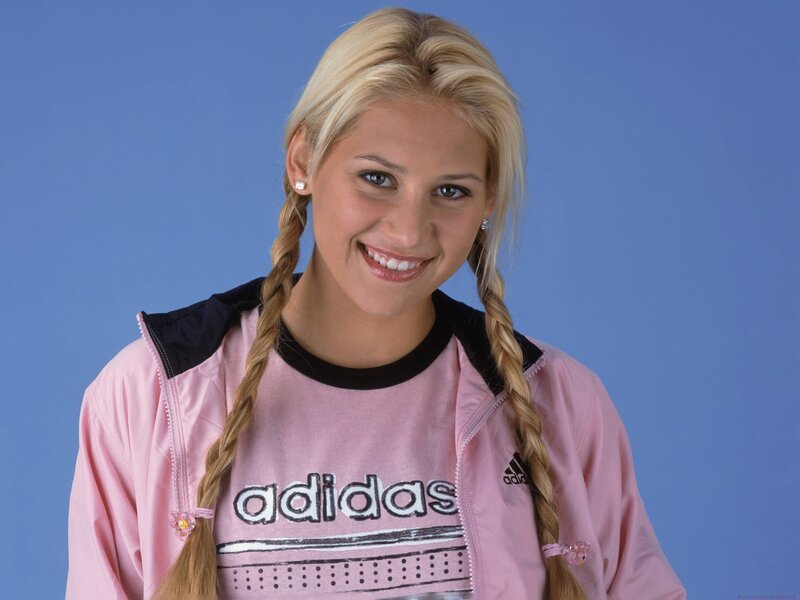 Smiling woman in pink jacket