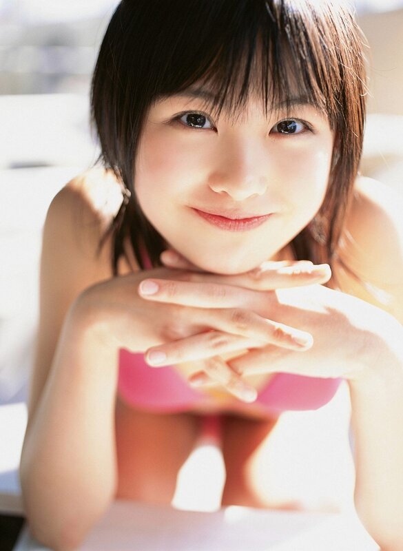 Smiling woman in pink top