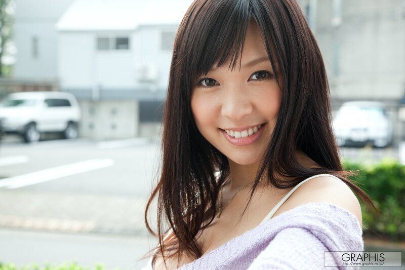 Smiling woman in purple sweater