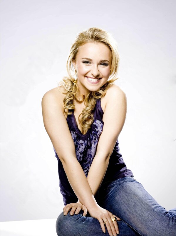 smiling woman in purple top