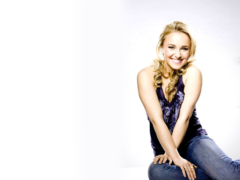 smiling woman in purple top