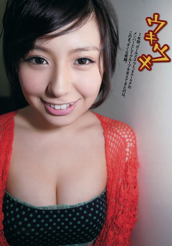 Smiling woman in red cardigan