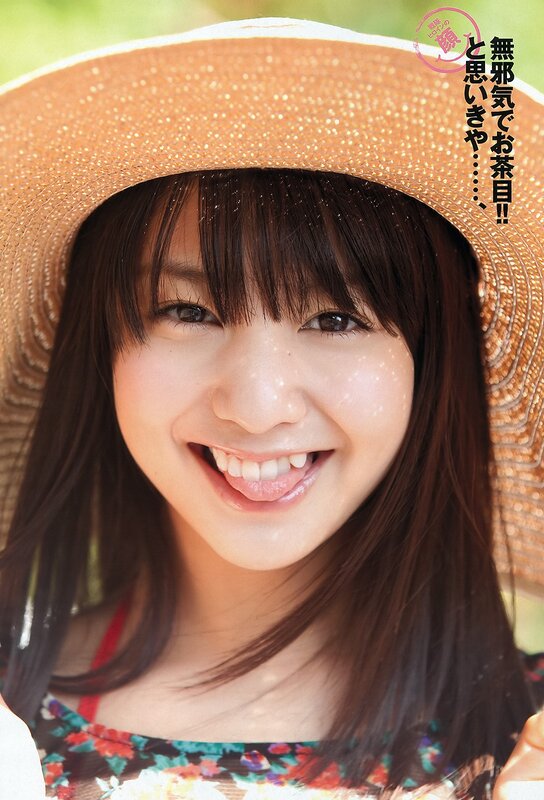 Smiling woman in straw hat