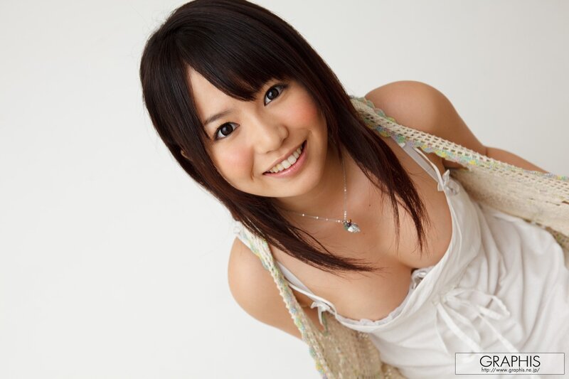 Smiling woman in white dress