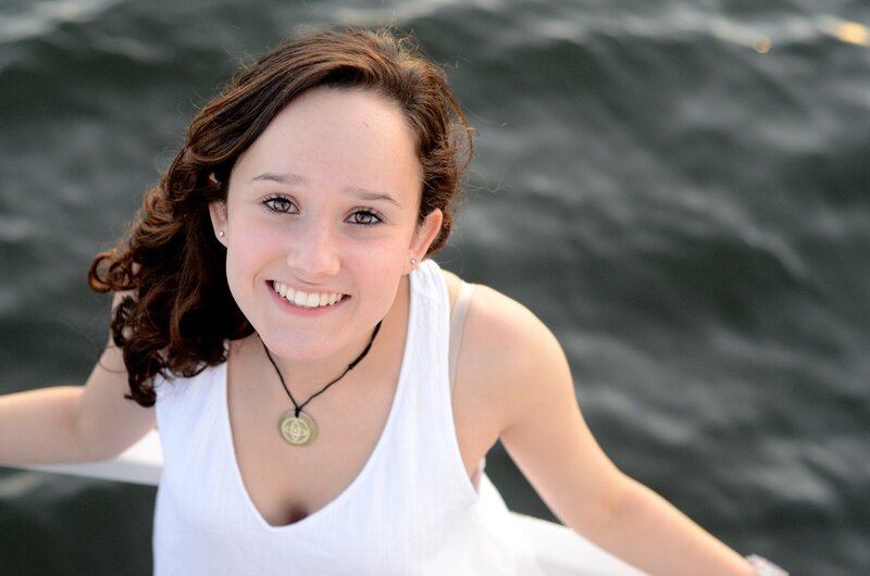 Smiling woman on a boat
