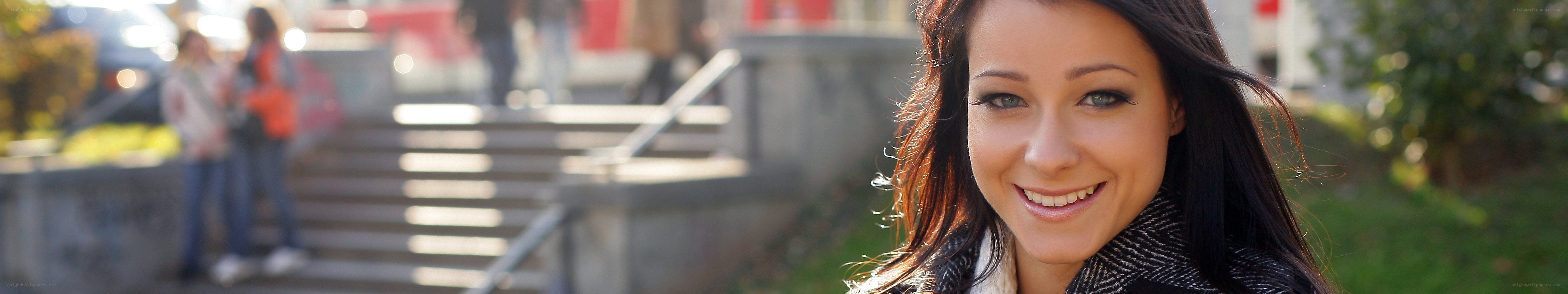 smiling woman on campus