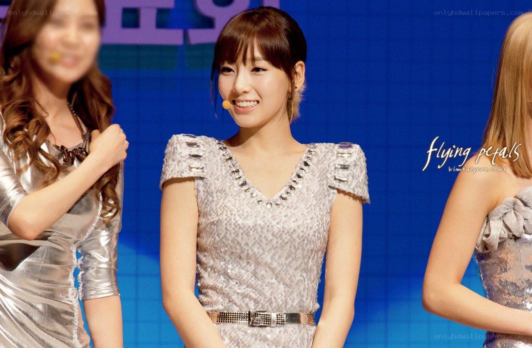 smiling woman on stage