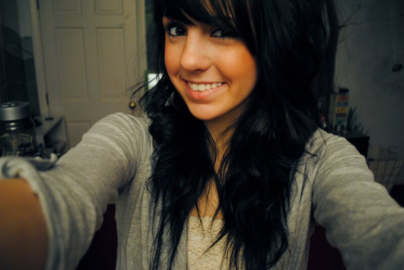 smiling woman taking selfie