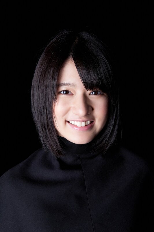 smiling woman with black hair