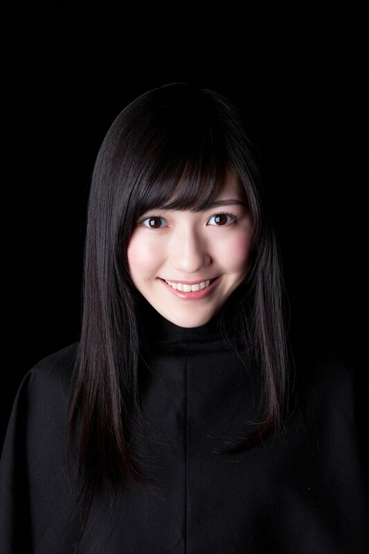 smiling woman with black hair