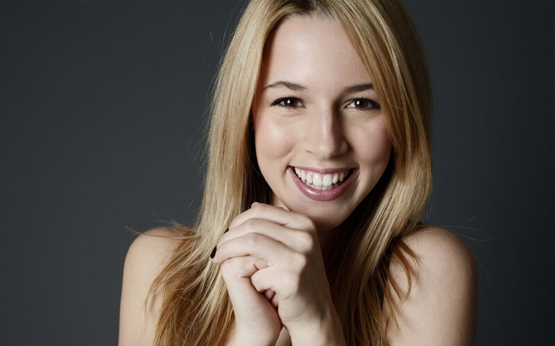smiling woman with blonde hair